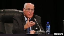 Retired Judge Ian Farlam speaks as the judicial commission of inquiry into the shootings at Lonmin's Marikana mine gets underway in Rustenburg, October 1, 2012.