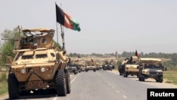 Afghan forces prepare for battle with Taliban on the outskirts of Kunduz city, northern Afghanistan, June 21, 2015. 