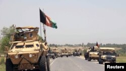 Pasukan Afghanistan bersiap lancarkan serangan kepada pemberontak Taliban di pinggiran kota Kunduz, Afghanistan utara, 21 Juni 2015. 