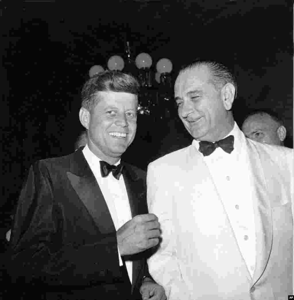 U.S. Sen. John F. Kennedy, left, and Sen. Lyndon Johnson, both running for the Democratic presidential nomination, are shown at a reception in Beverly Hills, Ca., July 10, 1960. The Democratic national convention opens tomorrow. (AP Photo)