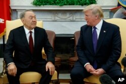 President Donald Trump meets with Kazakhstan's President Nursultan Nazarbayev in the Oval Office of the White House, Jan. 16, 2018, in Washington.