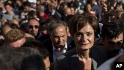 Canan Kaftancioglu, the head of Turkey's secular Republican People's Party in Istanbul, leaves the courthouse after her trial in Istanbul, Sept. 6, 2019.