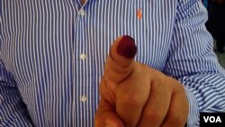 Retired pharmacist Makhmoud Mokhtar after voting in central Cairo, Egypt, June 16, 2012. (Y. Weeks/VOA)