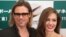 Brad Pitt was nominated for Best Actor for his work in the film "Moneyball," also nominated for Best Picture. He and Angelina Jolie are pictured at the Japan premiere of Moneyball Nov. 9, 2011. (AP)