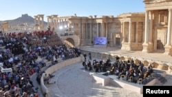 Russia's Mariinsky Theatre performs at the amphitheatre of the Syrian city of Palmyra, Syria in this handout picture provided by SANA, May 5, 2016.