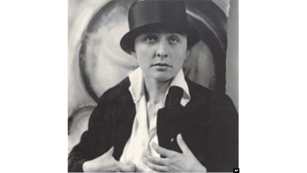 American artist Georgia O'Keeffe, seen here in a portrait from 1918, is best known for her paintings of flowers and landscapes, but she was also a gifted abstract artist.