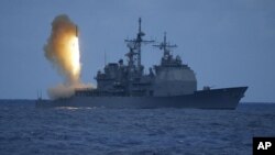 In a photo provided by the U.S. Navy, a Standard Missile-3 (SM-3) is launched from the Aegis cruiser USS Shiloh (CG 67), during a joint Missile Defense Agency, U.S. Navy ballistic missile flight test, off the coast of Kauai, Hawaii. (File Photo)