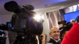 Mikhail Khodorkovsky, center, arrives for his first news conference after his release from a Russian prison, Berlin, Germany, Dec. 22, 2013.&nbsp;
