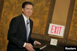 FILE - FBI Director James Comey arrives to deliver a speech at the Master of Science in Foreign Service CyberProject's sixth annual conference at Georgetown University in Washington D.C., April 26, 2016.