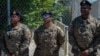 Members of the Royal Bahamas Defence Force arrive at Toussaint Louverture International Airport in Port-au-Prince, Haiti, Oct. 18, 2024. The U.N. Security Council voted unanimously on Friday to expand an arms embargo on Haiti as the nation struggles to wrest control from gangs. 