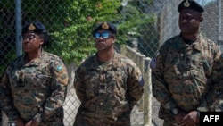 Members of the Royal Bahamas Defence Force arrive at Toussaint Louverture International Airport in Port-au-Prince, Haiti, Oct. 18, 2024. The U.N. Security Council voted unanimously on Friday to expand an arms embargo on Haiti as the nation struggles to wrest control from gangs. 