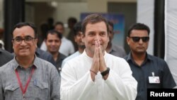 FILE - Rahul Gandhi, president of India's main opposition Congress party, leaves after casting his vote at a polling station in New Delhi, May 12, 2019.