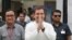 FILE - Rahul Gandhi, president of India's main opposition Congress party, leaves after casting his vote at a polling station in New Delhi, May 12, 2019.