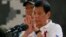 Philippine President Rodrigo Duterte gestures while addressing the Philippine Army Scout Rangers during his visit to their headquarters at Camp Tecson in San Miguel township, north of Manila, Philippines, Sept. 15, 2016.