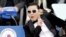 South Korean rapper PSY performs before President Park Geun-hye's presidential inauguration ceremony at the National Assembly in Seoul, South Korea.
