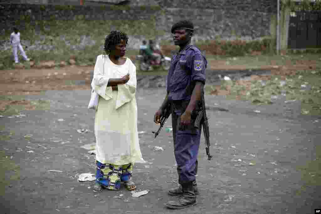 A Police Nationale du Congo (PNC) officer outside a stadium in Goma, eastern Congo, December 3, 2012.