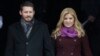 Kelly Clarkson arrives with Brandon Blackstock for the ceremonial swearing-in of President Barack Obama at the U.S. Capitol during the 57th Presidential Inauguration in Washington, Jan. 21, 2013.