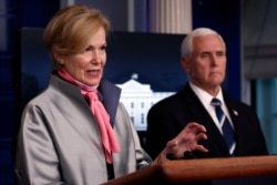 FILE - Dr. Deborah Birx, White House coronavirus response coordinator, speaks about the coronavirus in the James Brady Press Briefing Room of the White House, April 7, 2020, in Washington, as Vice President Mike Pence looks on.