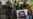 FILE - Pakistani journalists protest to condemn an attack on their colleague, Ahmed Noorani, pictured in the poster, in Karachi, Pakistan, Oct. 30, 2017.