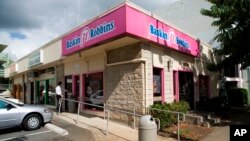 FILE - A 2008 photo shows the Baskin-Robbins ice cream shop in Honolulu, Hawaii, where President Barack Obama once worked. Obama says his unglamorous first job scooping ice cream as a teenager taught him valuable lessons about responsibility and hard work