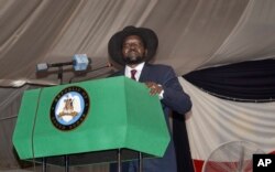 FILE - South Sudan President Salva Kiir voices his reservations before signing a peace deal in the capital Juba, South Sudan.