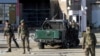 Afghan Blasts Target Police