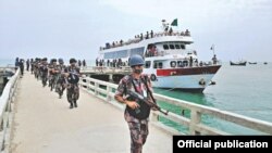 Border Guard Bangladesh troops land on the St Martin's Island in Cox's Bazar yesterday. This “heavily armed” deployment comes under a government directive for ensuring overall security of the island, the BGB said. Photo: Courtesy of BGB