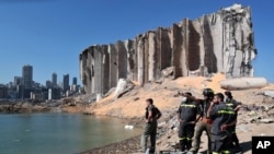 A rescue team surveys the site of this week's massive explosion in the port of Beirut, Lebanon, Aug. 7, 2020. 