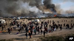 برخورد میان پناهجویان افغان و اریتیریایی در کمپ کاله شام سه شنبه سبب زخمی شدن چهار پناهجو شد