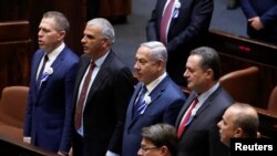 Israeli Prime Minister Benjamin Netanyahu sings the national anthem during the inauguration ceremony of Israel's 21st Knesset, or parliament, in Jerusalem, April 30, 2019. 