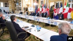FILE - U.S. Treasury Secretary Janet Yellen, back right, participates in a meeting of G-7 finance ministers at Lancaster House in London, June 4, 2021. The ministers on Sept. 2, 2022, pledged to put in place a system designed to cap Russia’s income from oil sales.