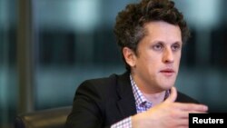 FILE - Aaron Levie, co-founder and chief executive of Box, speaks during Reuters Global Technology Summit in San Francisco, June 19, 2013. 