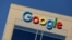 The Google logo is pictured atop an office building in Irvine, California, Aug. 7, 2017.