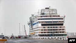 The Italian registered cruise ship 'Aidamar' docked in the Belgian port of Zeebrugge, March 11, 2020.