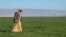 Mahdi Abu Enad, a Sunni Arab farmer, walks in a field in the northern Iraqi town of Sinjar, Feb. 5, 2019. 