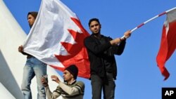 Photo d'archives: Des jeunes lors d'une manifestation à Bahreïn.