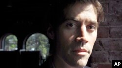 FILE - James Foley, pictured in May 2011, was beheaded by Islamic militants last year; he was one of 61 journalists killed in 2014, according to data from the Committee to Protect Journalists.