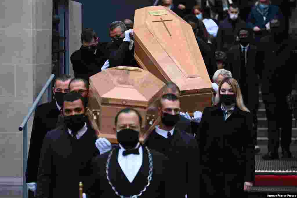 Pallbearers carry the coffins of twin brothers Igor and Grichka Bogdanoff, aged 72, at the Madeleine church during the funeral ceremony in Paris, France. The twins who became the faces of a famed 1980s science TV program before winning notoriety for their cosmetic surgery, died within a week from each other - Grichka on Dec. 28, 2021 and Igor on Jan. 3, 2022 - from Covid-19, after refusing the vaccination.