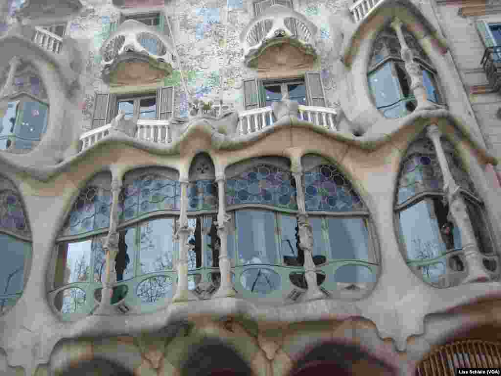 A close-up view of Casa Batllo's facade, which shows its skeletal quality, which has led locals to refer to the structure as House of Bones, in Barcelona. 