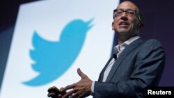 FILE - Twitter CEO Dick Costolo gestures during a conference at the Cannes Lions in Cannes, France, June 20, 2012. 