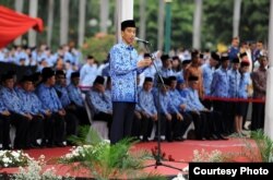 Presiden Joko Widodo menjadi inspektur upacara dalam peringatan ulang tahun Korps Pegawai Republik Indonesia ke-43 di Lapangan Monas Jakarta (1/12). (Courtesy Photo: Cabinet Secretary)