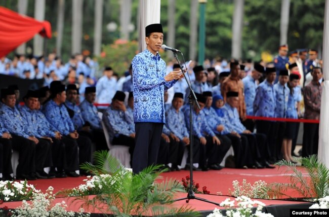 Presiden Joko Widodo menjadi inspektur upacara dalam peringatan ulang tahun Korps Pegawai Republik Indonesia ke-43 di Lapangan Monas Jakarta (1/12). (Courtesy Photo: Cabinet Secretary)