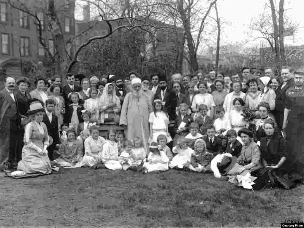 In 1912, Abdu’l Baha spent from April to December touring North America. He is shown here (at center) with Bahá’ís in Lincoln Park, Chicago, in 1912.