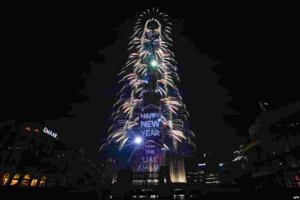 Fireworks explode at the Burj Khalifah, said to be the world’s tallest building, on New Year's Eve to welcome 2019 in Dubai, United Arab Emirates, Dec. 31, 2018. 