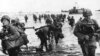 U.S. reinforcements land on Omaha beach during the Normandy D-Day landings near Vierville sur Mer, France, on June 6, 1944 in this handout photo provided by the US National Archives. 