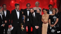 D.B Weiss, and cast and crew from “Game of Thrones” accept the award for outstanding drama series at the 68th Prime Time Emmy Awards on September 18, 2016 in Los Angeles.