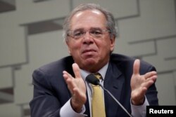 Brazil's Economy Minister Paulo Guedes gestures during a meeting at Economic Affairs Committee of the Brazilian Federal Senate in Brasilia, Brazil, March 27, 2019.
