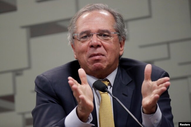 Brazil's Economy Minister Paulo Guedes gestures during a meeting at Economic Affairs Committee of the Brazilian Federal Senate in Brasilia, Brazil, March 27, 2019.