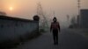 Artist Liu Bolin Live Streams Beijing Smog to Raise Awareness
