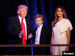 Republican U.S. president-elect Donald Trump stands with his son Barron and wife Melania at his election night rally in Manhattan, New York, Nov. 9, 2016.